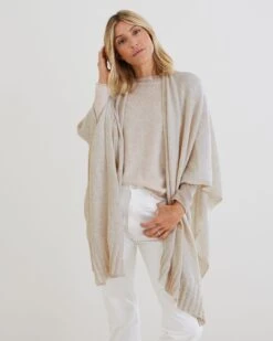 The Luxy Wrap 27 The Luxy Wrap -Mersea Sales Store womens beige cashmere super soft drapy travel wrap wide rib detailed hemline front view drape 2