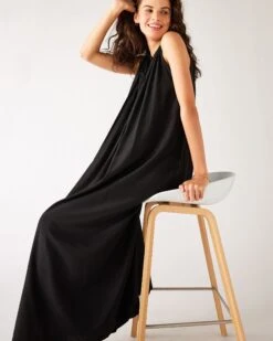 Patio Dress 30 Patio Dress -Mersea Sales Store womens black loose fit pullover maxi dress sitting side view