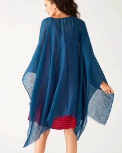 Nellie Wrap -Mersea Sales Store womens blue breathable lightweight fringe hem multi functional nellie travel wrap rear view