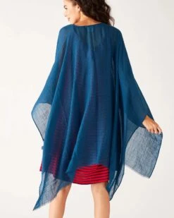 MerSea - Nellie Wrap - Infinity Blue 9 MerSea - Nellie Wrap - Infinity Blue -Mersea Sales Store womens blue breathable lightweight fringe hem multi functional nellie travel wrap rear view 4428146f 515d 4de5 8eee 91153524f80d