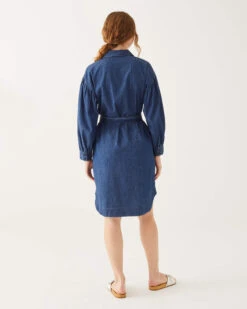 Frankie Chambray Shirt Dress 12 Frankie Chambray Shirt Dress -Mersea Sales Store womens cotton lightweight frankie chambray shirt dress with front patch and side seem pockets button down placket and cuffs rear view