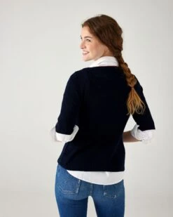 Acton Rib Knit Sweater -Mersea Sales Store womens fall autumn navy short sleeve rib knit peplum waistline sweater with red neckline detail rear view