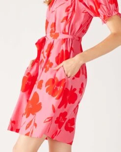 Ibiza Dress -Mersea Sales Store womens floral pink ruffled shoulder midi dress side view walking close up pocket detail