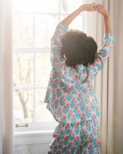 Over The Cotton Moon Pajama Set - Block Print Poppy -Mersea Sales Store womens flower poppy print wide legged pajama set with pockets and ribbon tie rear view stretching