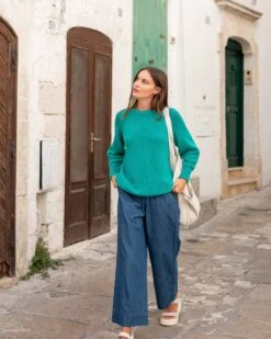 Amalfi Crewneck Pullover -Mersea Sales Store womens kelly green soft crewneck stitched sweater front view travel destination look