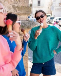 Amalfi Crewneck Pullover -Mersea Sales Store womens kelly green soft crewneck stitched sweater front view travel destination look ice cream