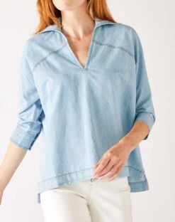 Poppy Popover Top -Mersea Sales Store womens light blue chambray relaxed fit cuffed sleeves faux pearl snap detail popover top front view