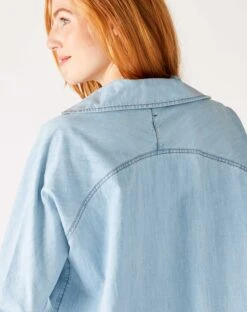 Poppy Popover Top -Mersea Sales Store womens light blue chambray relaxed fit cuffed sleeves faux pearl snap detail popover top rear view