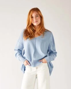 Toujours V-neck Sweater -Mersea Sales Store womens light blue everyday high low waist jersey knit pullover v neck troujour sweater front view hands in pockets