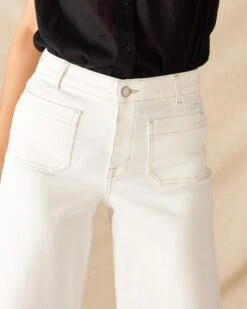 Nomad Cropped Sailor Jean -Mersea Sales Store womens patch pocket stretchy cropped wide leg white jeans front view close up patch pocket detail