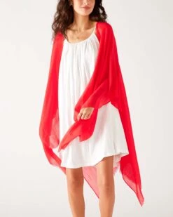 Nellie Wrap -Mersea Sales Store womens red breathable lightweight fringe hem multi functional nellie travel wrap front view shoulder drape
