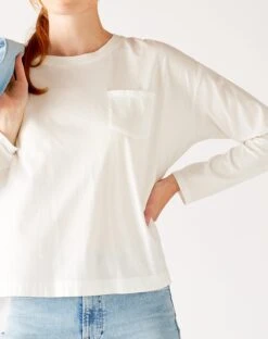 Moderne Pocket Crewneck Tee -Mersea Sales Store womens white front pocket pleated back crew neck long sleeve tee front view pocket detail