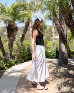 Sonnet Maxi Skirt -Mersea Sales Store womens white maxi skirt side view travel